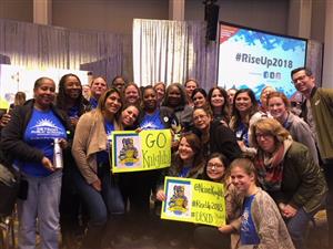 Neinas administrator and staff standing together at Cobo Hall